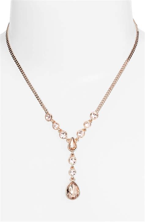 givenchy crystal y necklace matching earrings|Givenchy swarovski necklace.